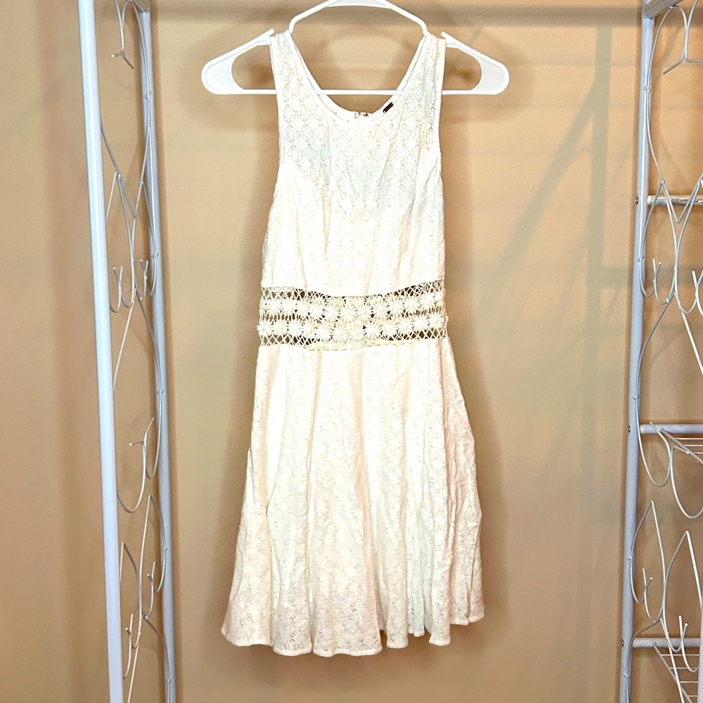 White Summer Dress with flower cutout detail.